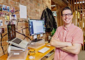 Smiling man at desk