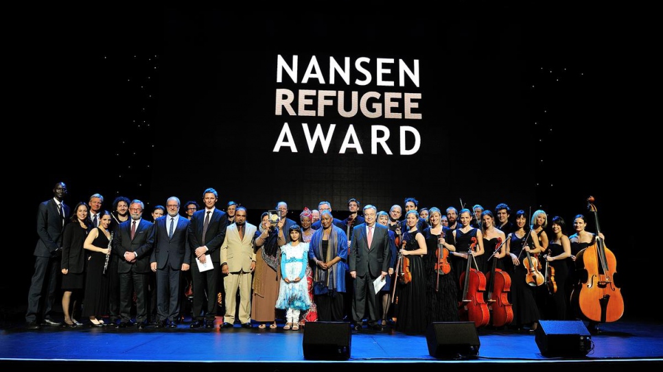 Afghan refugee and educator, Aqeela Asifi, accepts the 2015 Nansen Refugee Award in Geneva, Switzerland.
