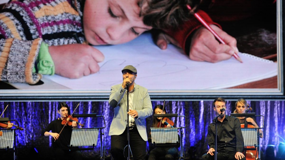 Swedish-Lebanese singer-songwriter Maher Zain performs a new song entitled 'One Day' at the 2014 Nansen Refugee Award ceremony. 