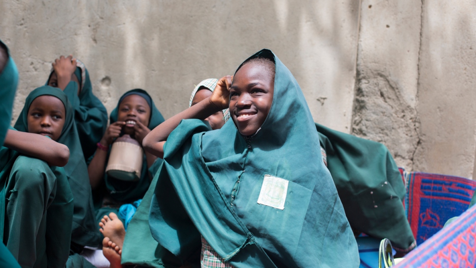 Hauwa Madu, 13, whose father was killed by Boko Haram, has found happiness again at school.