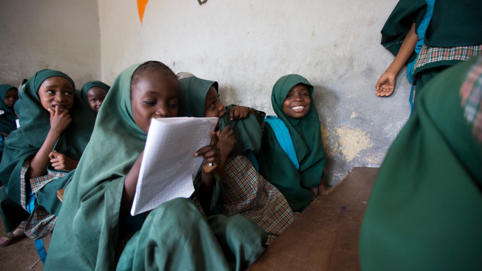 Maryam Goni Umar, 6, reads to delighted class mates at the first school Nansen Award winner Mustapha set up in Maiduguri.
