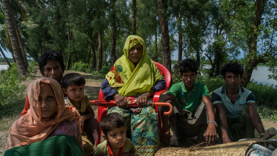 "I will never go back. They are burning the houses."

Family members carried Mustafa, 80, in a chair from Myanmar to Whaikhyang, Bangladesh. They are Rohingya refugees from Mommistaung village in Maungdaw, where she says a massacre took place.