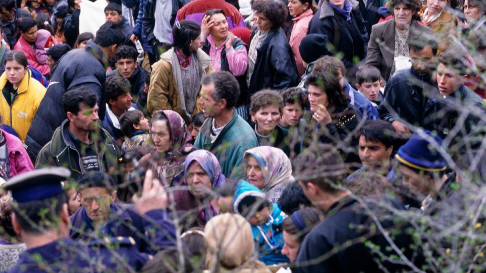 Refugees from Kosovo* arrive in Blace, in the former Yugoslav Republic of Macedonia, in 1999.
