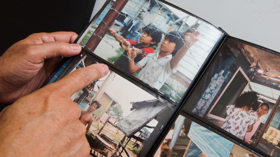 Thanh Dang shows a photograph from his three plus years at Galang refugee camp in Indonesia.  
