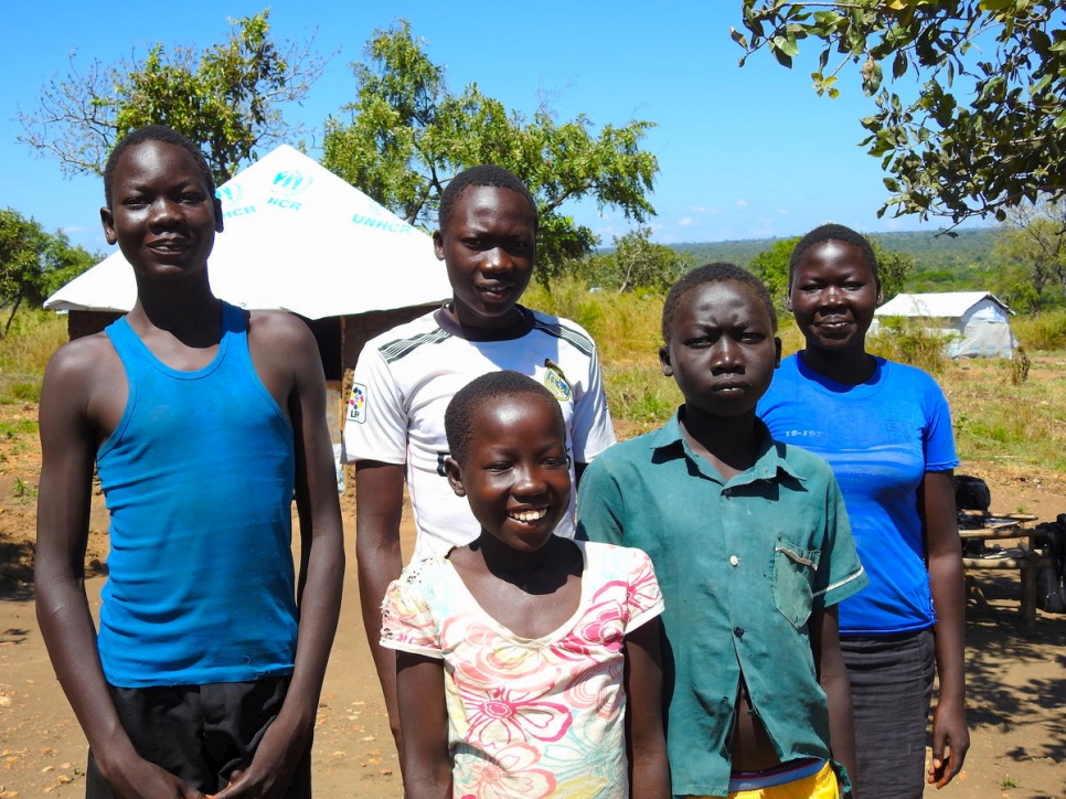 Uganda. South Sudanese refugee teenager takes care of younger siblings