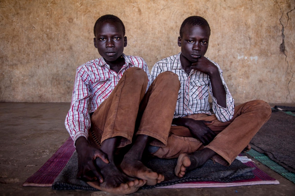 Kenya. South Sudan refugee twins Jacob and Simon, 14 in Kakuma Refugee Settlement
