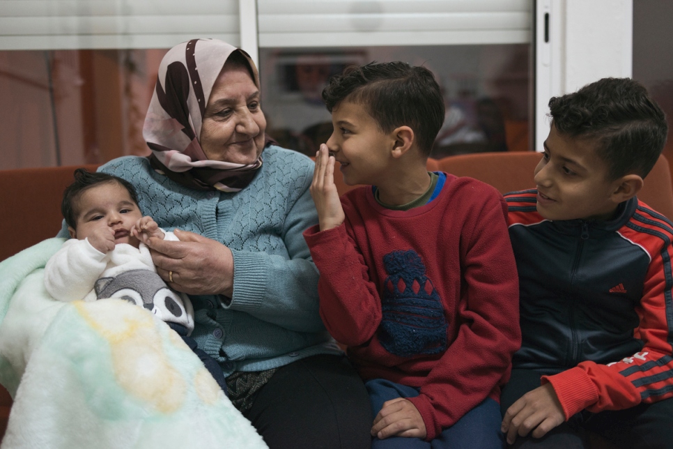 Grandmother Taqia and great grandchildren.