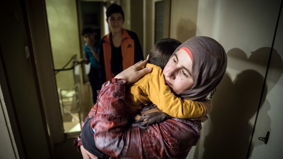Sara Al-Said, who has three children of her own, is also raising her sister's two sons after she and her husband were killed in a bomb blast in Syria.