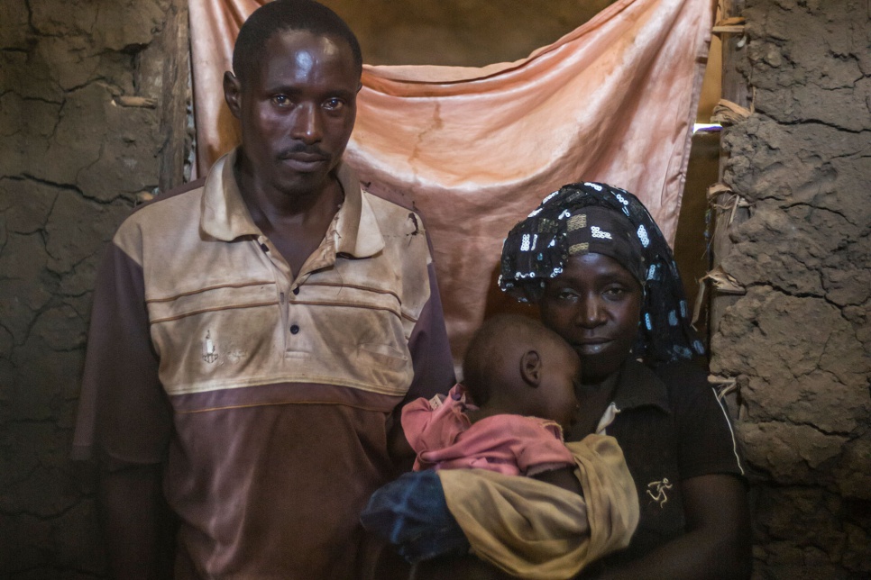 Innocent and Immaculate are living with their daughter Flavia and five other children at their home in Uganda's Nakivale refugee settlement.