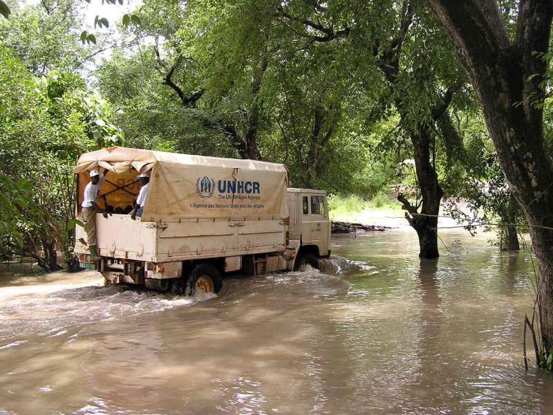 At the Chadian border town of Bettel, a UNHCR truck makes its way through floodwaters to transfer some 10,000 new arrivals from the Central African Republic to the Chad town of Gore.  