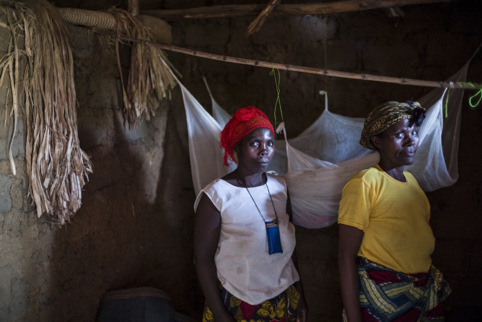 Malaria is a serious problem in Uganda's Nakivale refugee settlement. As community health workers, Vaste and Dorothée distribute mosquito nets to help prevent the disease.