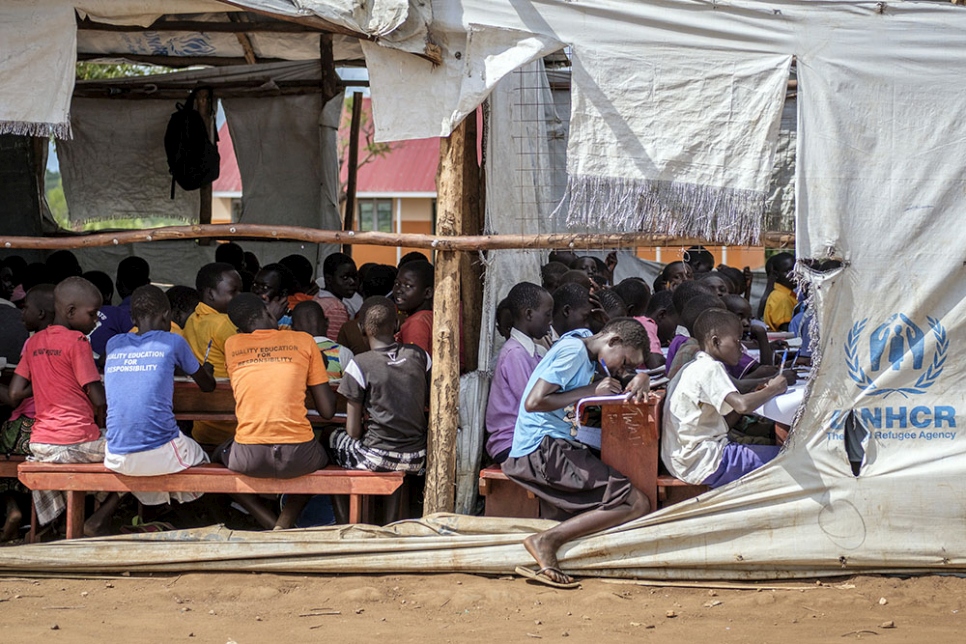 An elementary school temporarily constructed from wood and plastic sheeting is in disrepair after strong storms at Bidibidi refugee settlement in Yumbe District, northern Uganda, 2 May 2017.