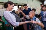 UNHCR Special Envoy Angelina Jolie meets eight-year-old Falak on a vis...