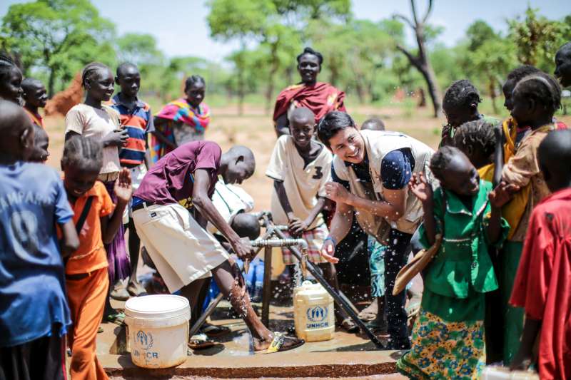 UNHCR National Goodwill Ambassador Jung Woo-sung plays with children from Sudan's South Kordofan at the Ajuong Thok refugee camp in South Sudan's Unity State during a visit in May 2015.