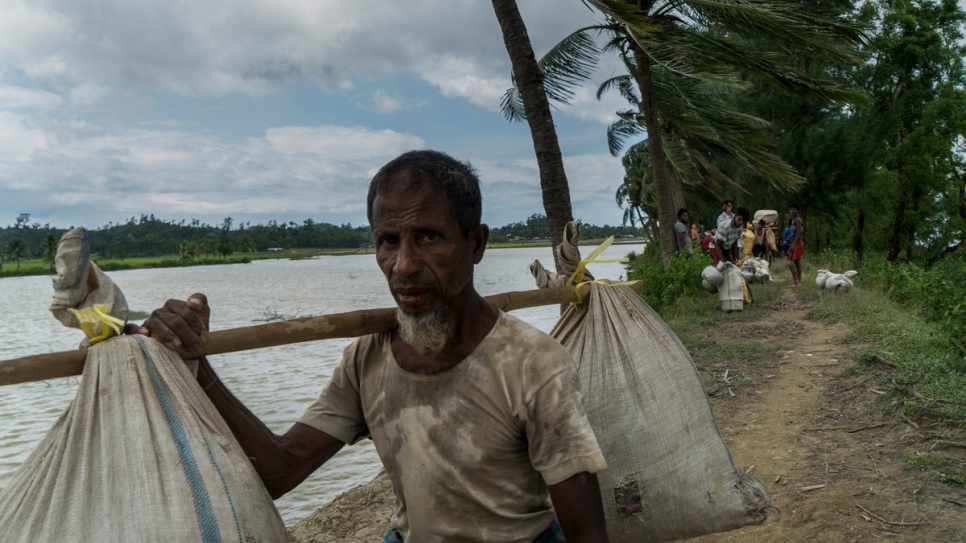 A Rohingya refugee soon after crossing into Bangladesh from Myanmar near Whaikhyang, Bangladesh.