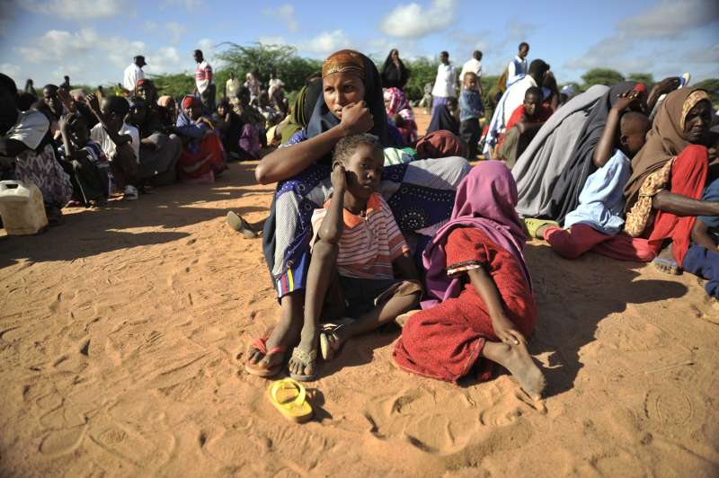 Kenya / Somali Refugees / Dadaab / Newly arrived refugees from Somalia wait for registration at IFO camp.  / UNHCR / R. Gangale / May 2010
