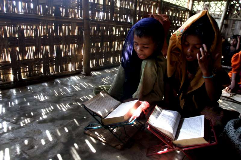 Because there are no regular schools at the Teknaf site, children read the Koran in a madrassa, or religious learning institute.