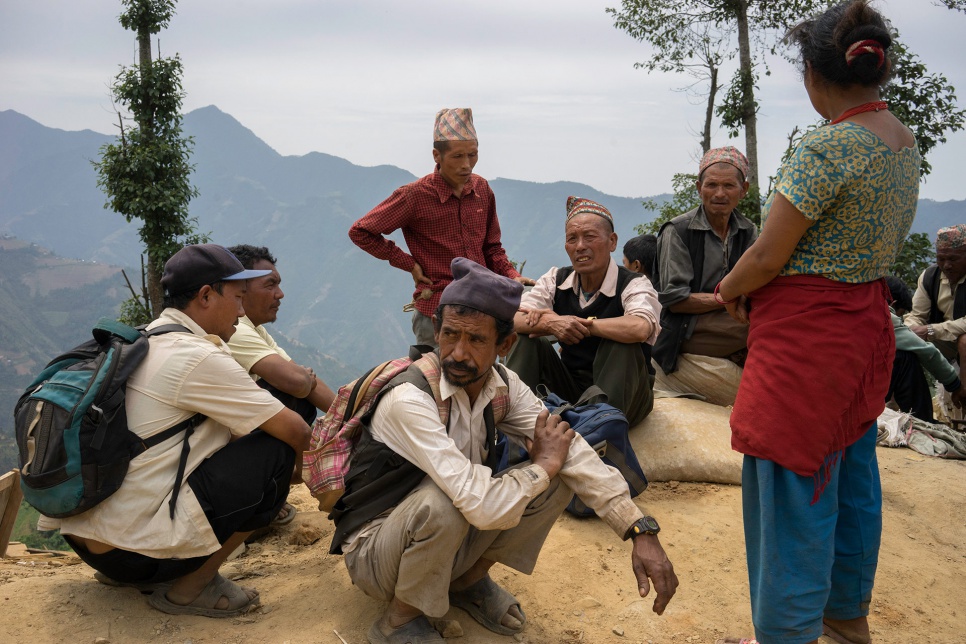 Survivors await the arrival of relief supplies in Jhankridanda village, in Nepal's Lalitpur District.