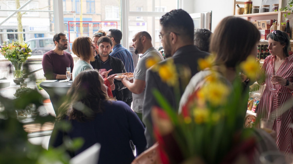 Guests attend the launch of Yara Al Adib's first kitchen in Antwerp, Belgium.