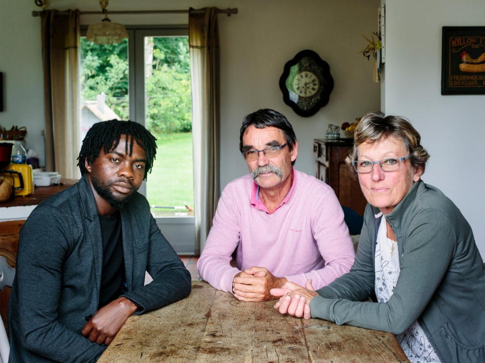 Catherine and Jean-Pierre host Assadik (left), a refugee from Sudan, in Saint-Josse. Assadik spent months in the Jungle, the notorious Calais camp, before being welcomed by the French couple.