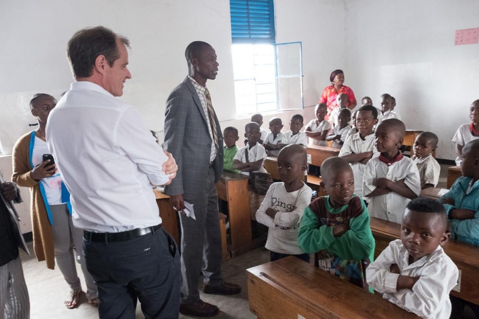 Germany's Ambassador to the DRC, Thomas Terstegen (left), visits a new classroom at Walugaba Primary School in Rusayo, where formerly displaced children have been reintegrated.