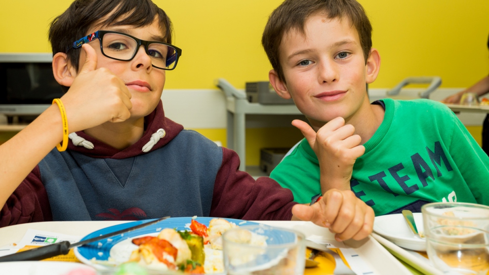 Lunch cooked by refugee chef Saber Hajaj gets the thumbs up from students at the Collège Louis Pergaud.