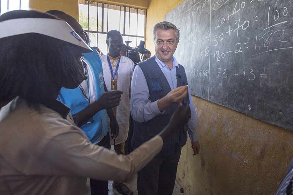 High Commissioner for Refugees Filippo Grandi chats to refugees in a classroom in Nguenyyiel Camp, Ethiopia.