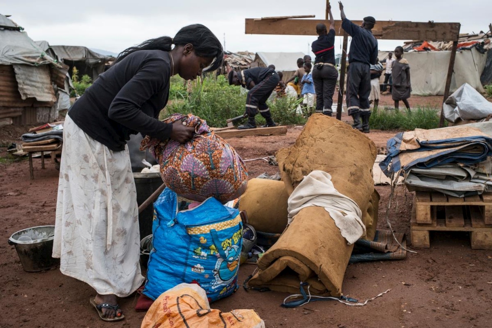 Central African Repulic. Displead people leaving M'Poko site to rebuild their life