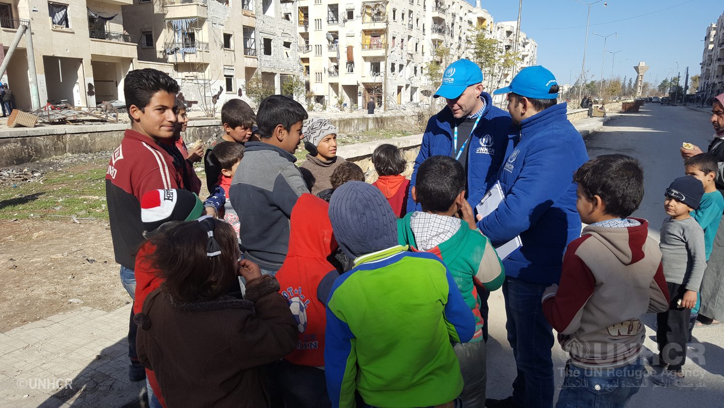 UNHCR staff visit displaced families to assess the needs in Hanano neighbourhood