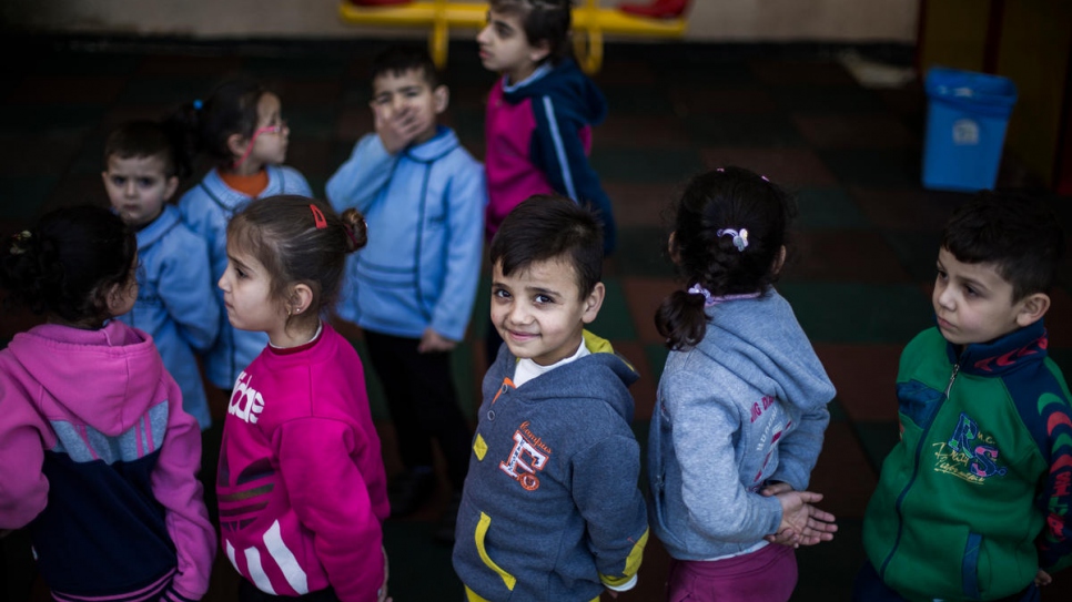 Mohammad, a young Syrian refugee from the ancient desert city of Palmyra, stands in a row during a break at the Father Andeweg Institute for the Deaf (FAID) on the outskirts of Beirut in Lebanon.