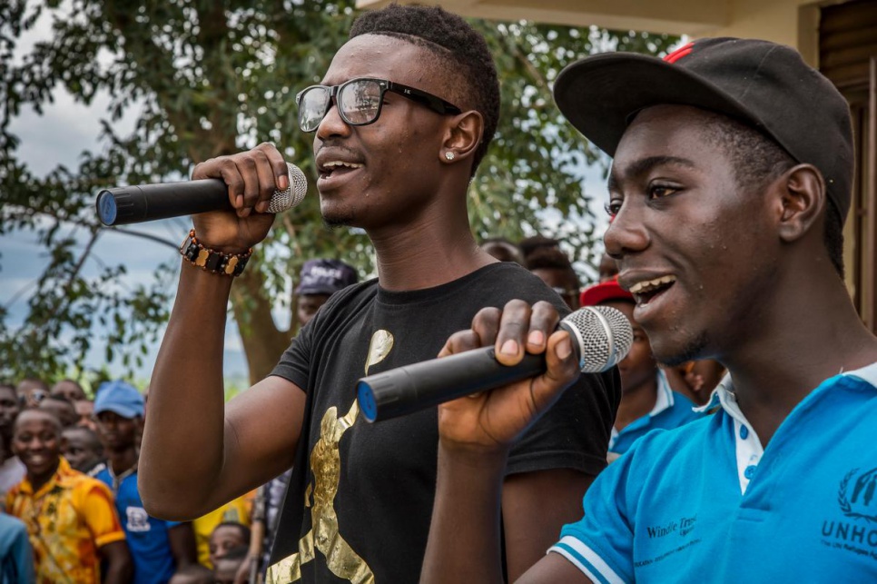 Congolese musicians sing for Deputy High Commissioner for Refugees Kelly T. Clements during a visit to Nakivale. The group previously won a talent contest at the settlement.