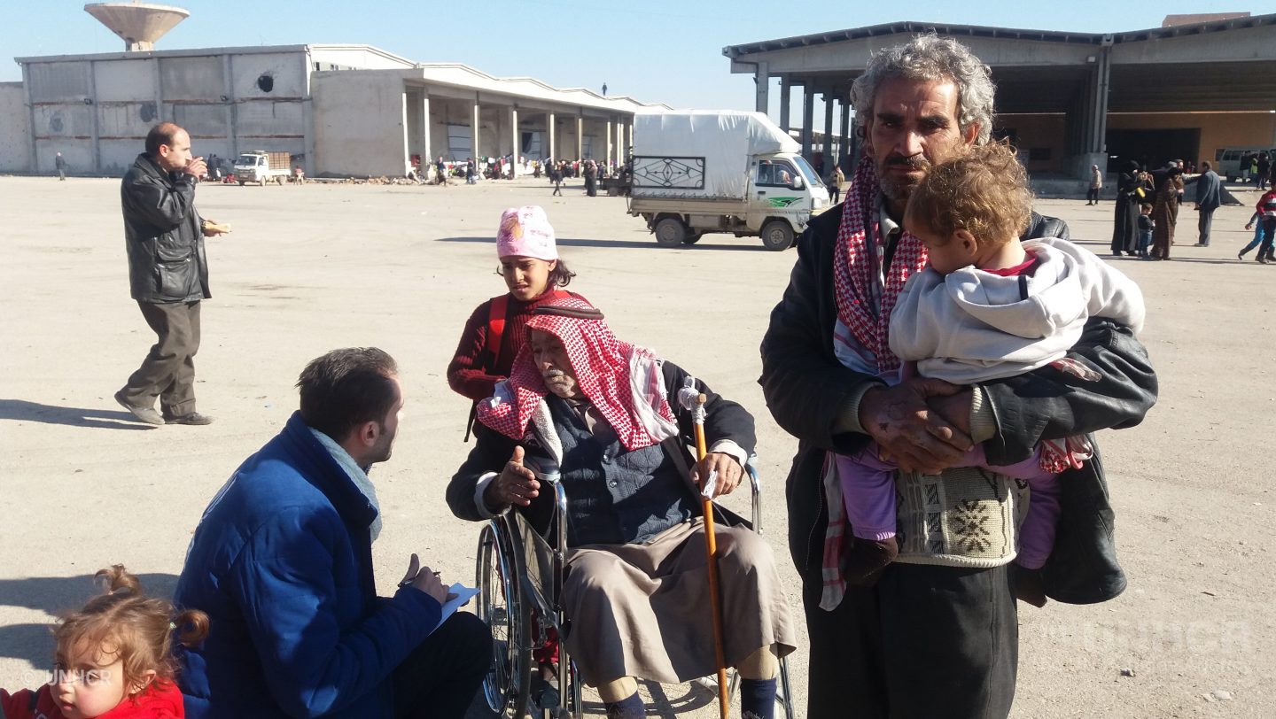 UNHCR staff visit displaced families to assess the needs in Mahalej shelter