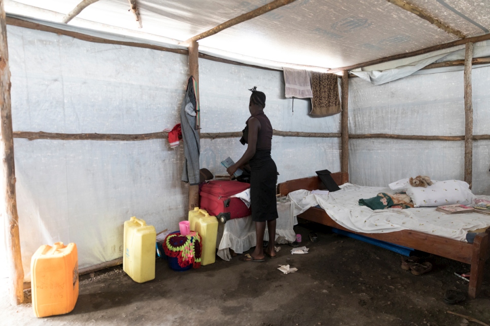 Gladys, 18, looks after her four siblings and three cousins in the Imvepi refugee settlement. They are unaccompanied South Sudanese child refugees and live in an emergency shelter built by UNHCR. For protection reasons faces cannot be shown.  