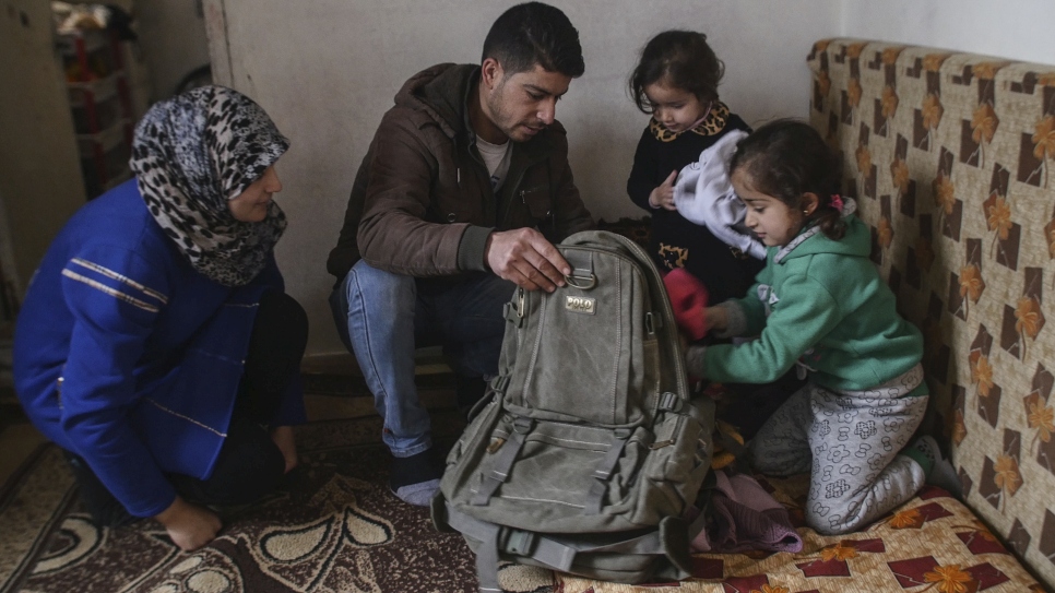 Syrian refugees Jamal, Hiba's and their children are shown here packing their belongings ahead of their scheduled resettlement to the UK in March 2017.