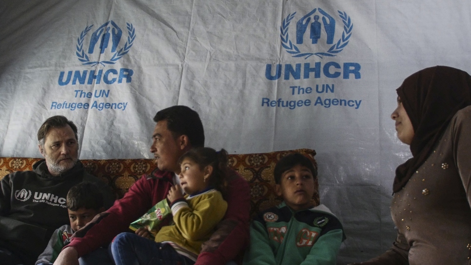 David learns about the experiences of a family of Syrian refugees in their makeshift shelter in Lebanon's Bekaa Valley.