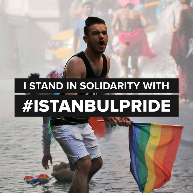 I STAND IN SOLIDARITY WITH #ISTANBULPRIDE is written over a picture of a man shouting and holding a rainbow flag at a Pride march.
