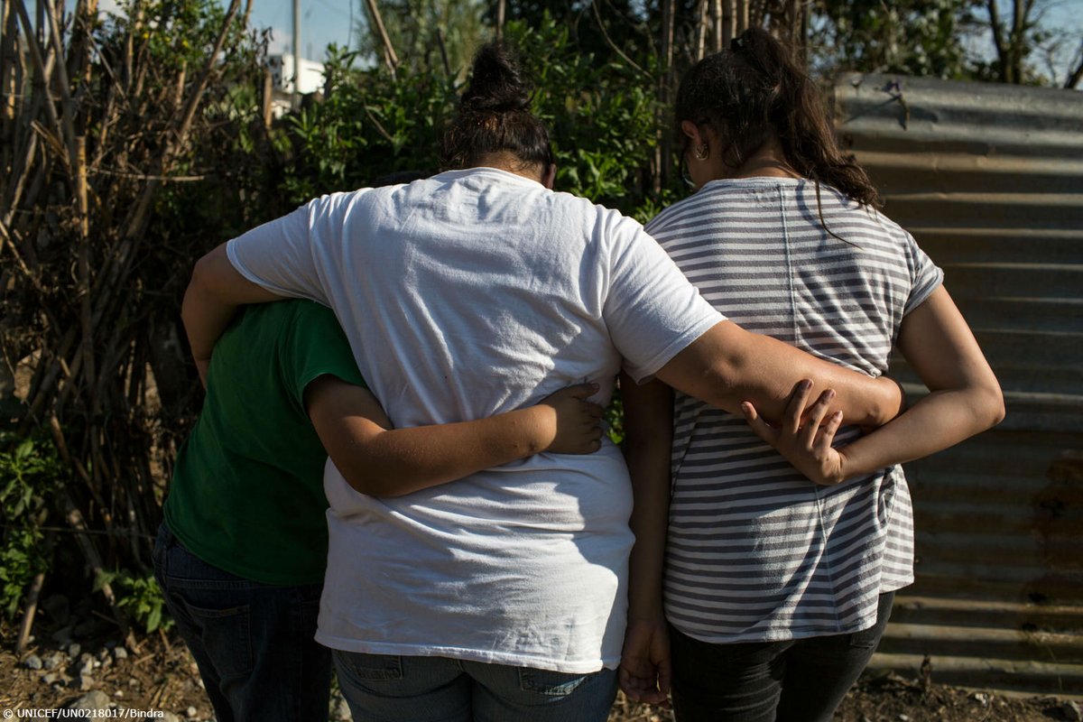 Mary, 32, stands outside her home with her daughter, Sami, 12, and her son, Jason in Chimaltenango, Guatemala.