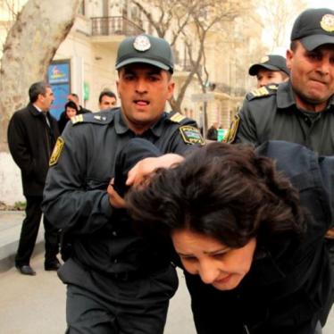 Azerbaijan Courts Convict Two Outspoken Government Critics