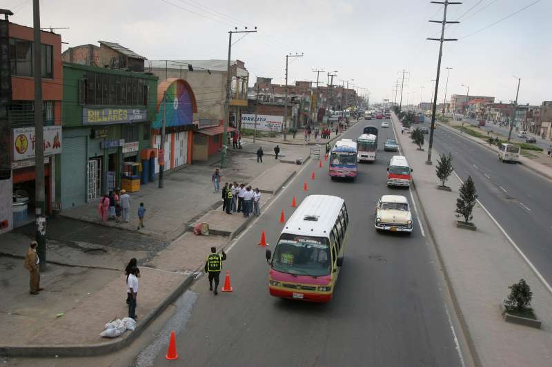 A bus stop in one of Bogota's suburbs, where many displaced people end up living.