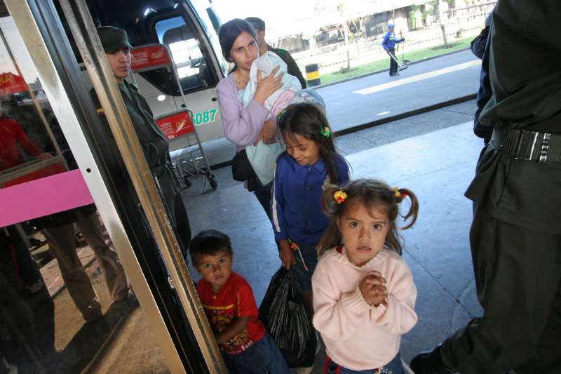 Internally displaced people usually arrive in the city with little money and nowhere to go. Many head straight to the slum areas or "barrios" located in the hills outside Bogota.