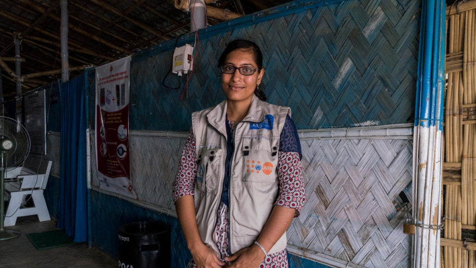 Nirea Khatun, a supervisory midwife for UNFPA, poses for a portrait at a primary health care facility funded by UNHCR and UNFPA in Kutupalong refugee site in Bangladesh.