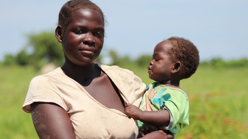 Esta fled her home town of Nizi with her husband and two young children. They have returned to Tchomia in Ituri province, but are not able to go back to Nizi because of continuing violence.