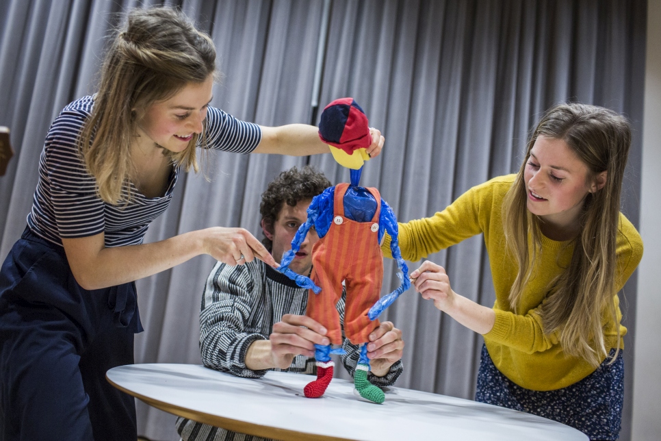 A theatre group made up of young volunteers rehearse in London