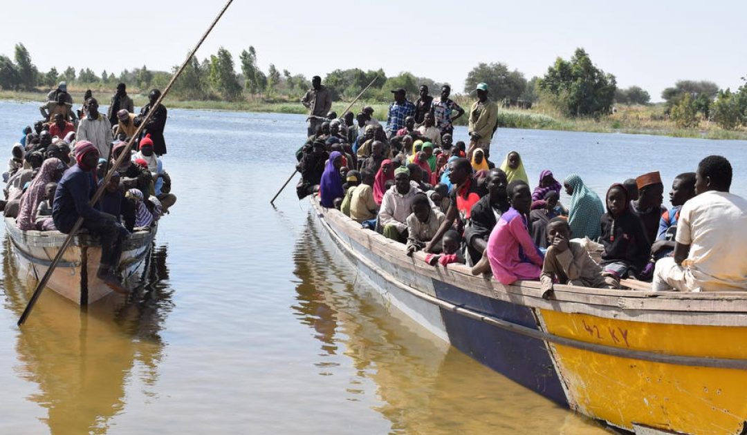 Surging violence in Nigeria drives thousands across borders