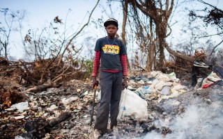 Joe spends his summer searching for metal scraps to earn money.