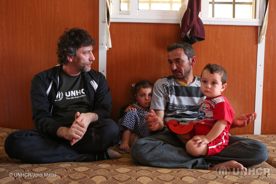 Jordan. UNHCR High Profile Supporter Neil Gaiman visits refugees at Zaatari camp