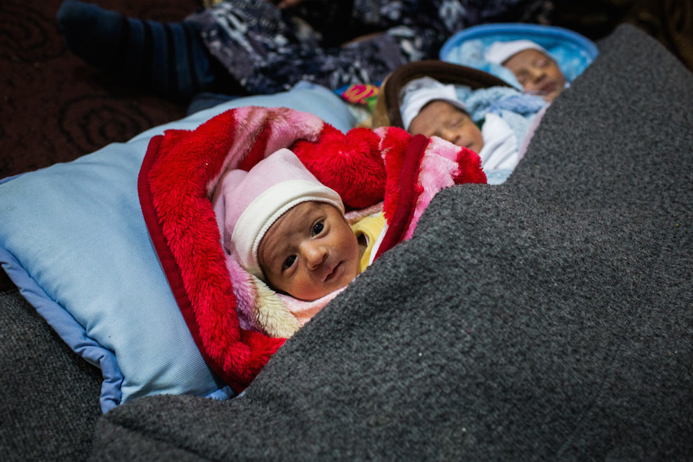 Triplets Riyadh, Ahmed and Khaled are among the very youngest of Syria's 3.3 million refugees. They were born on New Year's Day.