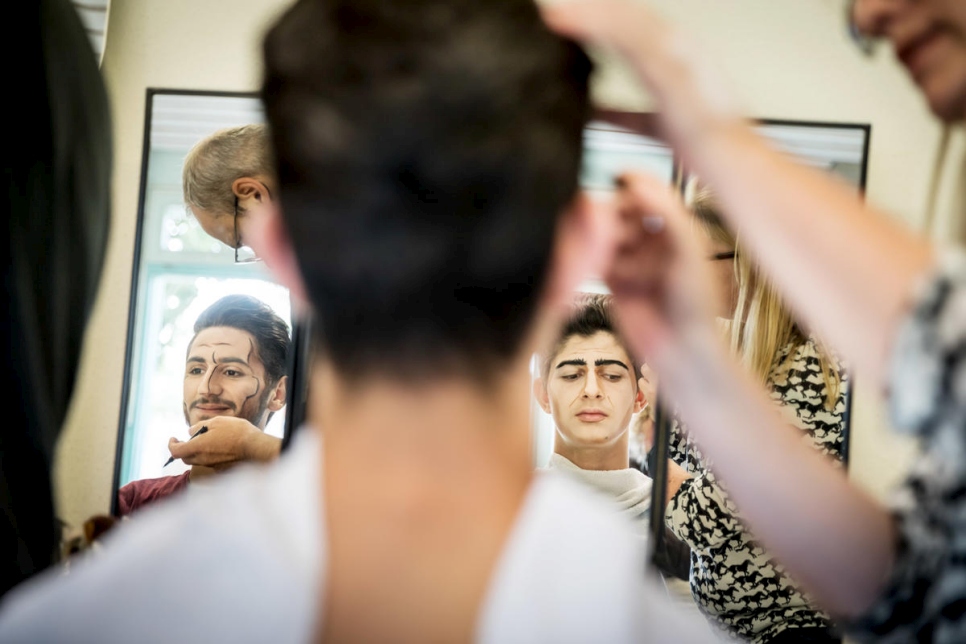 Two of the six Syrian members of the cast, Koutaiba Al Rahmoon (left) and Omar Kodaimi, in makeup before rehearsals for Verdi's "Don Carlos" by opera company Zukunft Kultur.