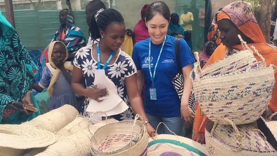 Keiko meets women displaying their arts and crafts on World Refugee Day in Maban refugee camp, South Sudan. The project was developed to empower women and girls.