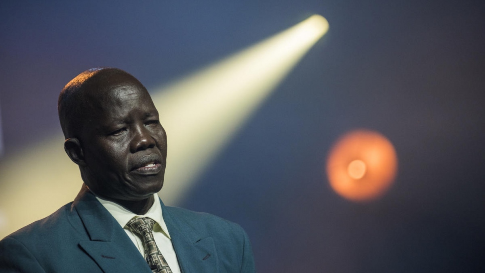 Dr. Evan Atar Adaha speaks after accepting the 2018 Nansen Refugee Award. He and his team carry out an average of 58 operations a week in difficult conditions at Maban County Hospital in South Sudan. 